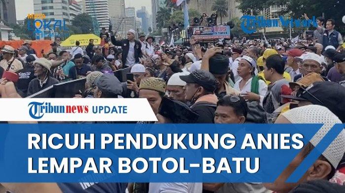 video-demo-di-patung-kuda-ricuh-pendukung-anies-prabowo-saling-lempar-batu-dan-botol.jpg